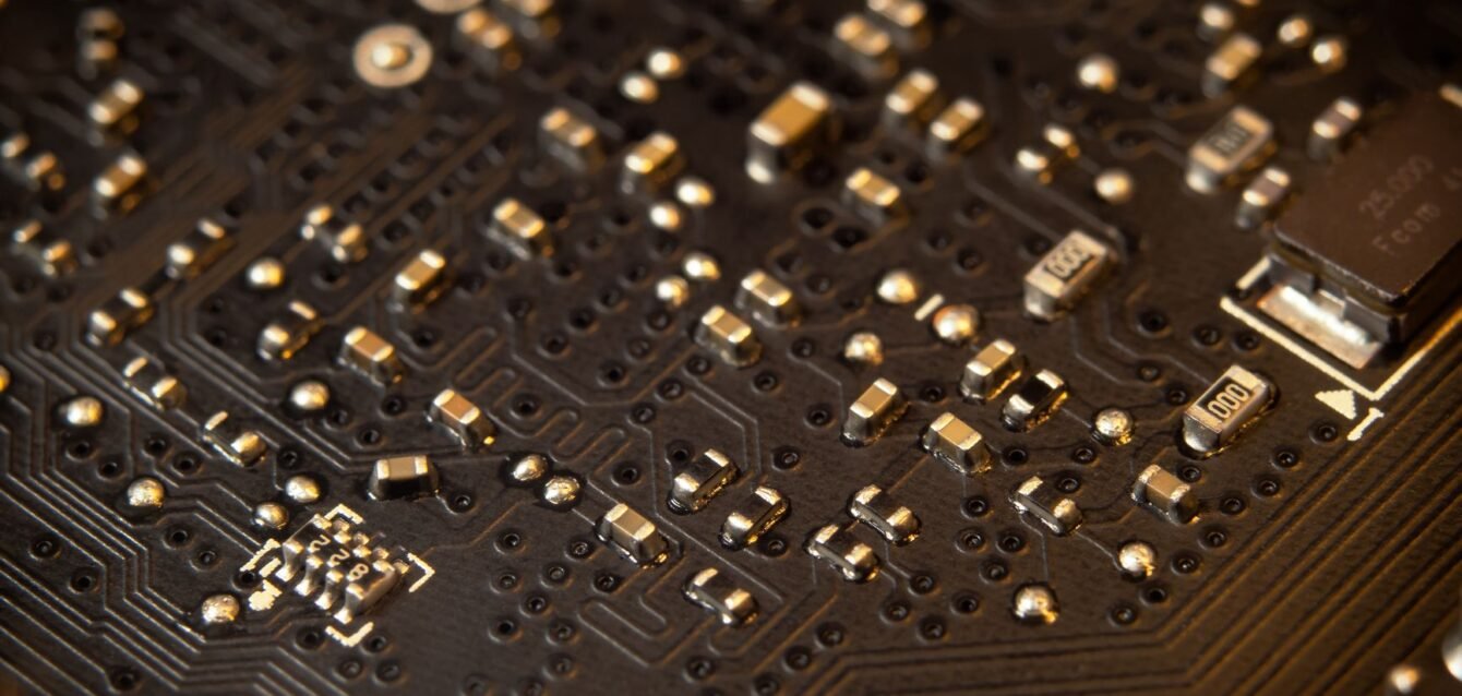 Detailed view of a circuit board showing various electronic components and traces.